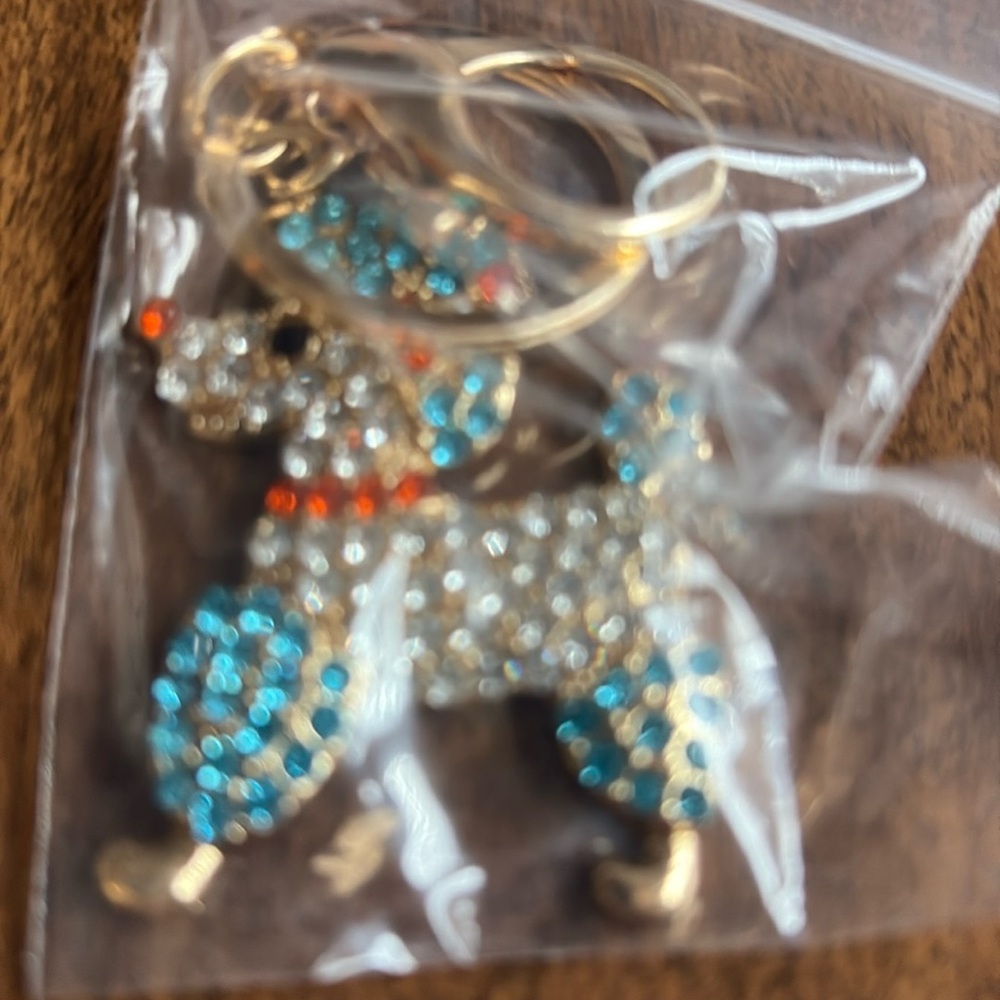 Sparkling poodle dog Keychain with blue orange Accents - Picture 5 of 5